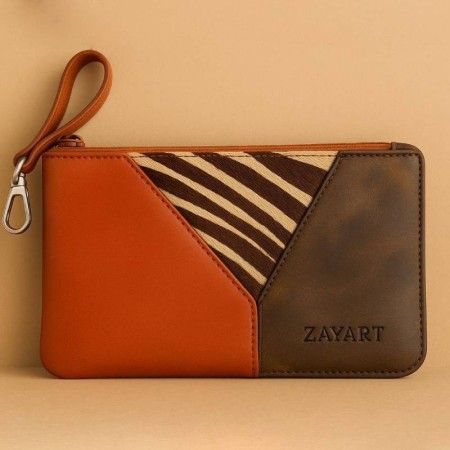 Brown leather clutch