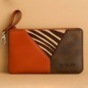 Brown leather clutch
