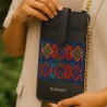 Small black pouch with colorful patterns